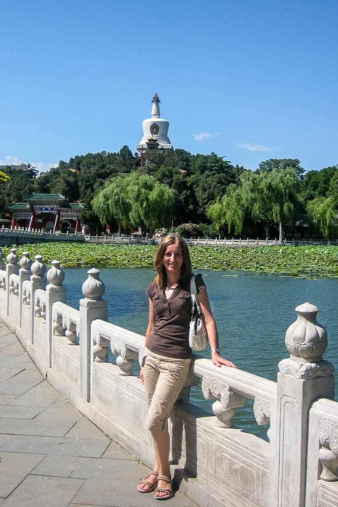 Beihai Park in Beijing, China with a gate, pagoda, and a lily lake in the background
